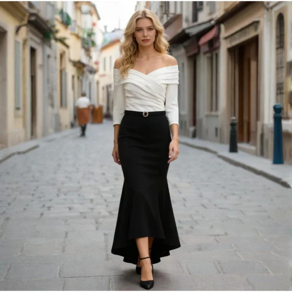 Black and white color-blocked off-the-shoulder twisted fishtail gown