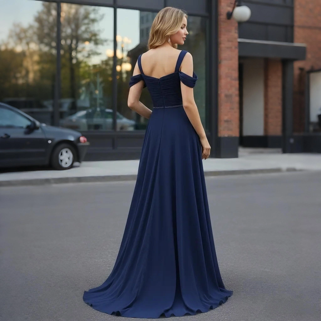 Second image of Navy blue off-the-shoulder ruffled gown with a long train