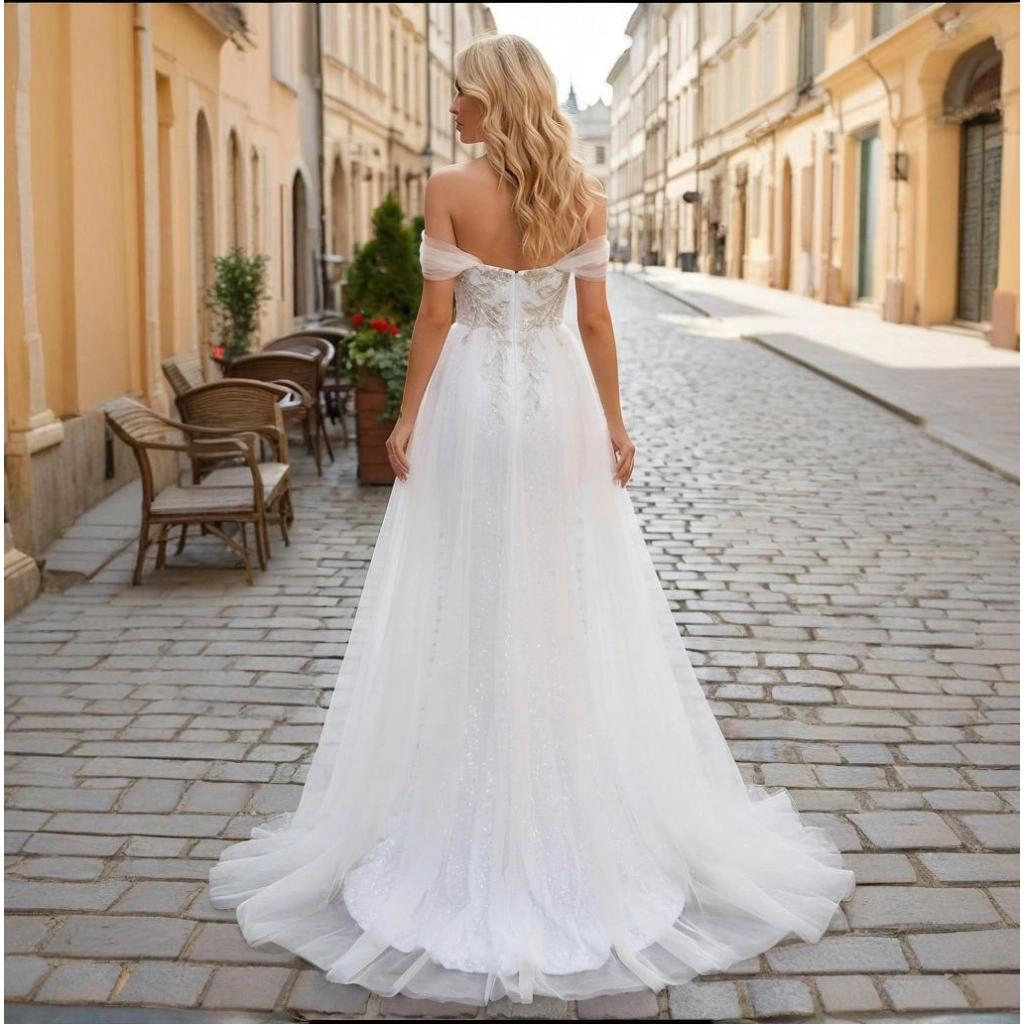 Second image of White sequin strapless embroidered train wedding dress
