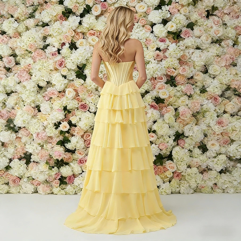 Second image of Light yellow strapless layered slit gown with a train